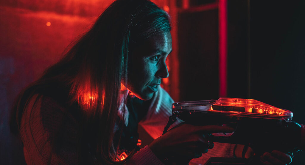 Concentrated player in an intense laser tag game